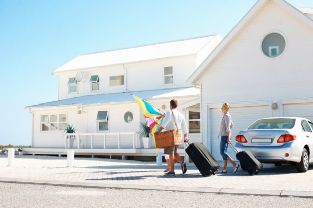 Family Arriving at Their Vacation Rental Beach House on the East Coast